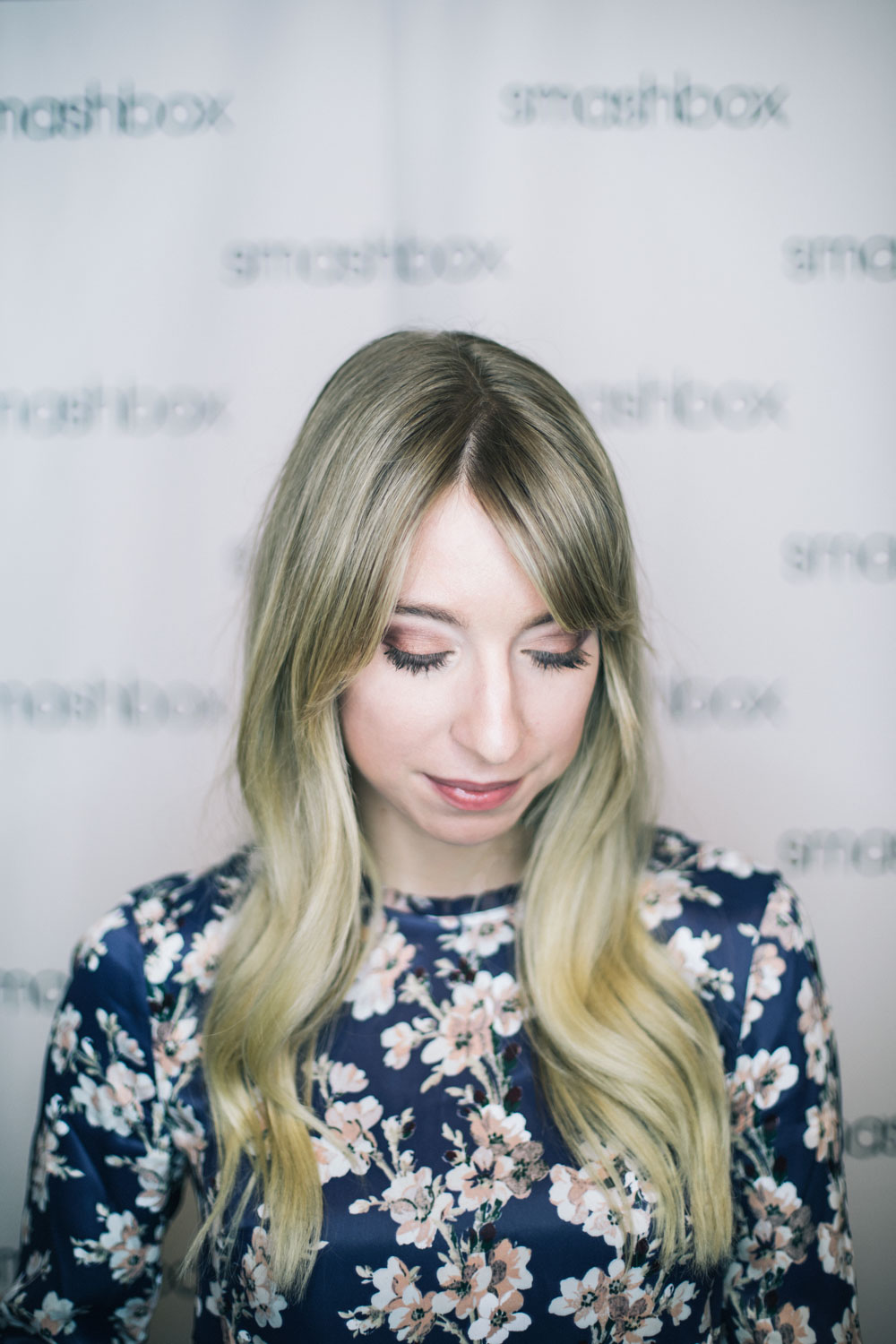 the blondielocks fashion and lifestyle blogger from toronto wearing a club monaco blouse with floral print and bell sleeves. Smashbox cover shot eye palettes review. smashbox cover shot eye shadow palette in golden hour. blonde wavy hair inspiration